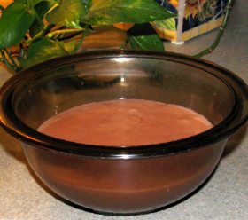 A bowl of chocolate tapioca pudding.